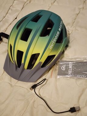 Outdoor Master Gradient Bike Helmet in Teal and Lime With Rechargeable Light. Nw